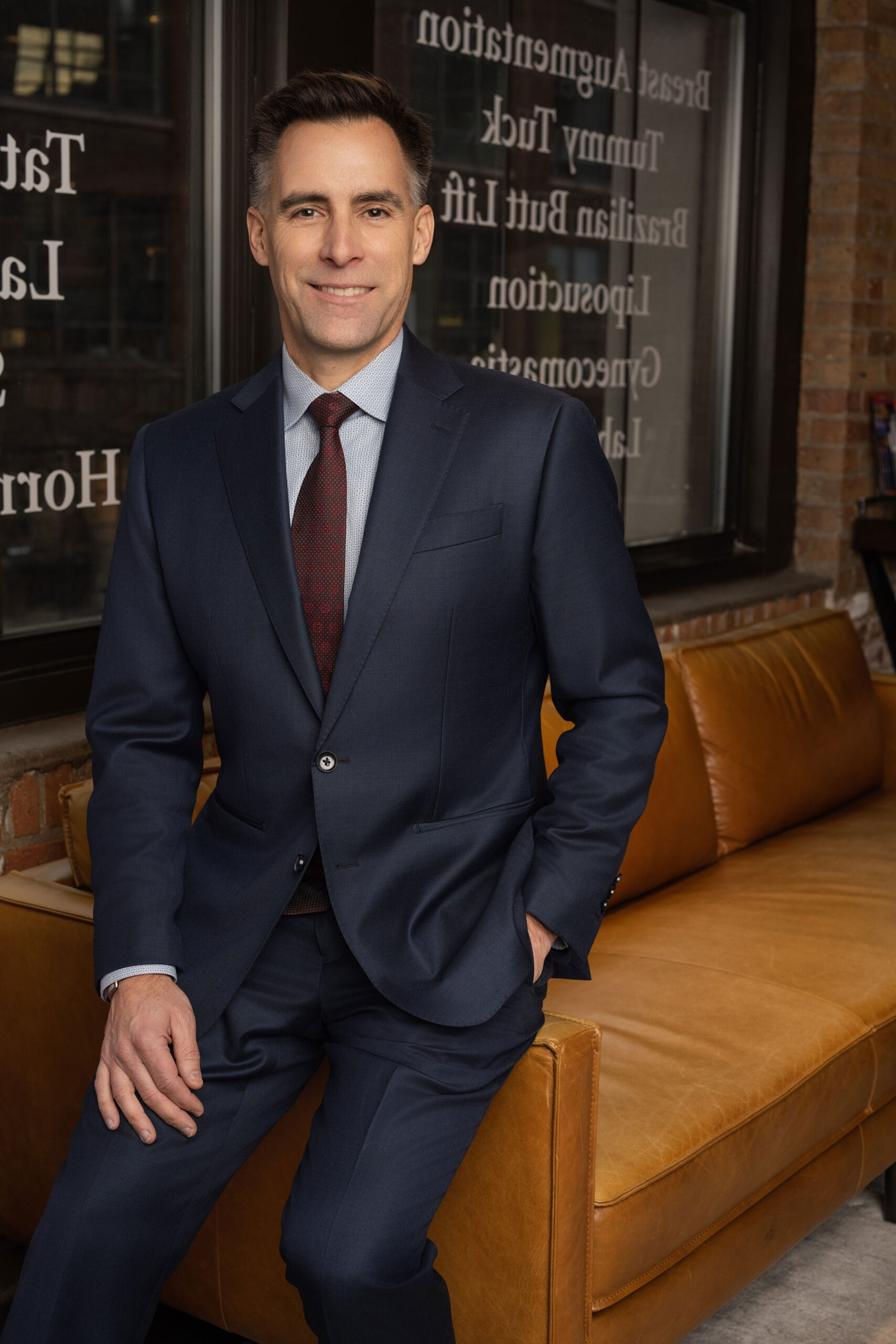 Dr. John D. Rachel, board-certified facial plastic surgeon at Chicago Breast and Body Aesthetics