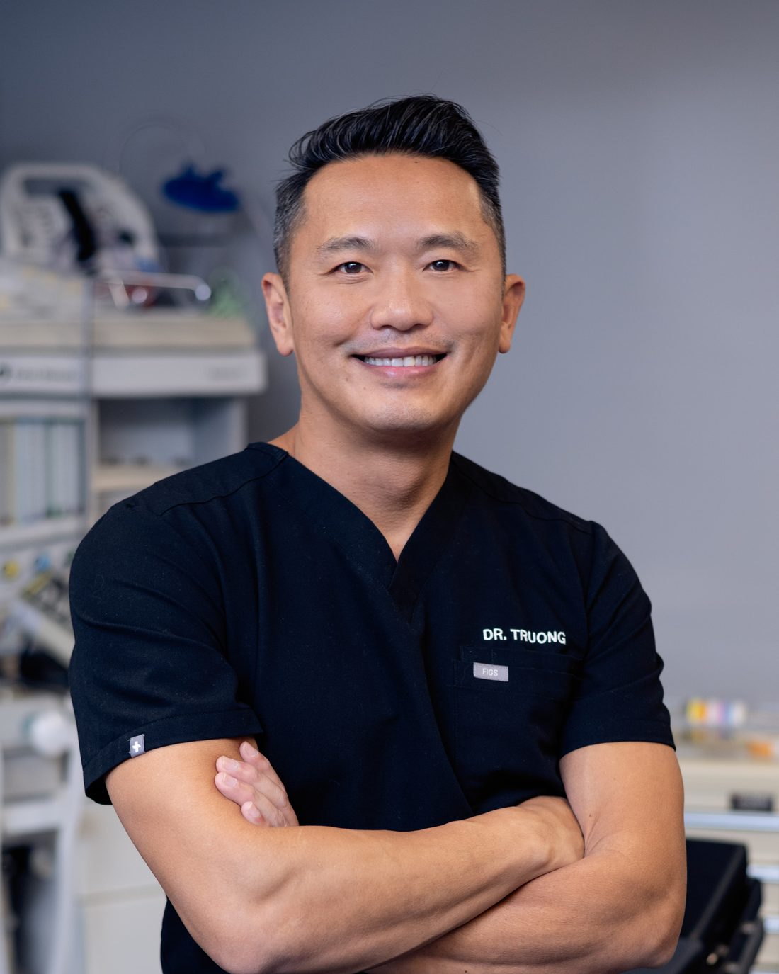 Dr. Anh-Tuan Truong, triple board-certified cosmetic surgeon and founder of Chicago Breast and Body Aesthetics